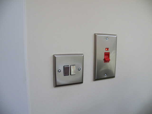 Varilight satin chrome 2-gang light switch & shower switch.
